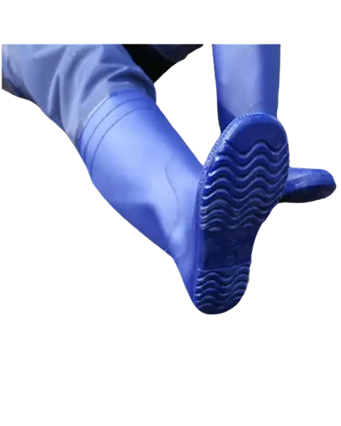 Close-up of the non-slip wavy tread pattern on the sole of a blue waterproof hip wader boot, isolated on white.