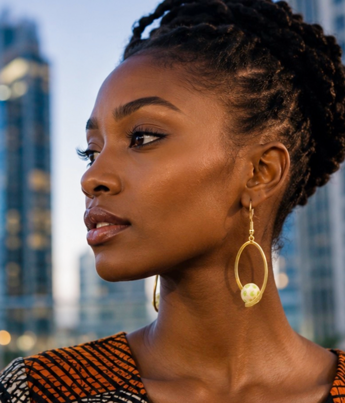 Gold Oval Drop Earrings with Green Accent Bead