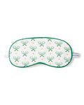 The Kids Sleep Mask in Match Point by Petite Plume features a white design with green racket and yellow ball prints. It includes an elastic strap labeled PETITE, ideal for tennis fans and a great match with tennis print pajamas.