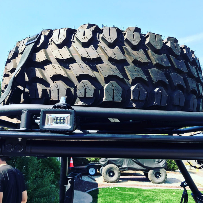 General-use  light pod with a universal mount on an off-road vehicle.