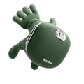 A green portable speaker shaped like a cartoon character with raised hands, floating against a light gray gradient background.
