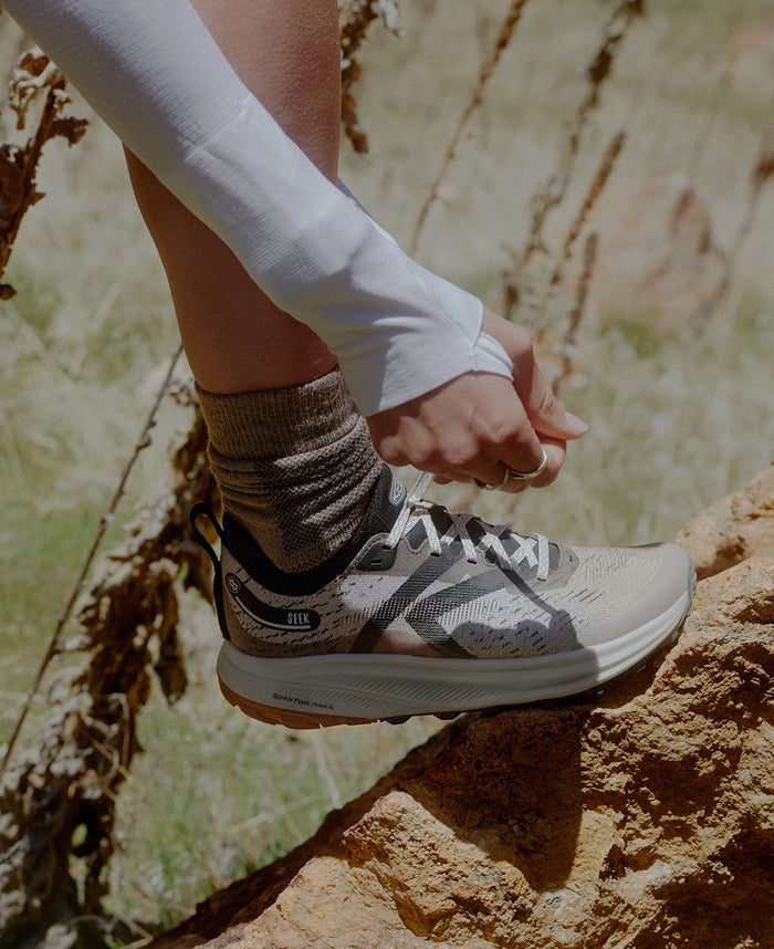 Women's Seek Trail Running Shoe  |  Black/Sunset Sand